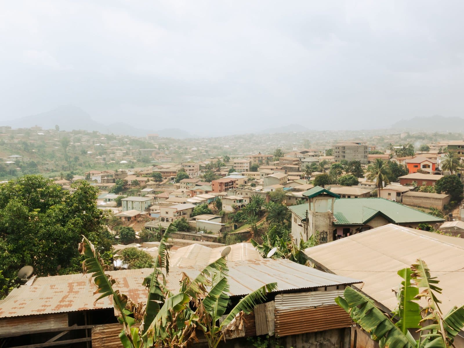 Yaoundé under the haze, its hills barely visible.